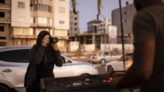 Samar Ab El-Ouf, a Palestinian freelance photojournalist, at work in the Gaza Strip