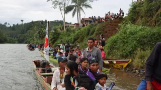 Boat ride to a remote conflict-affected community in Agusan del Sur, Philippines