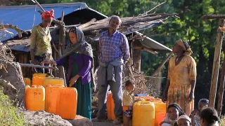 people collecting water from a water point in Lalibela town.