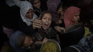 Women in distress in a very crowded place