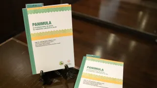 "IHL and Islamic law" book in Tagalog displayed on a desk
