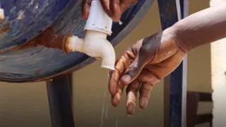 Sudan_disinfecting-hands-and-feet_cholera-treatment-centre-in-Gedaref-State