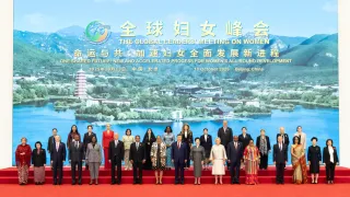 Group photo of distinguished guests attending the Global Leaders' Meeting on Women held in Beijing, China