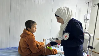 Hasakeh Governorate, Al-Hol camp, hospital. Hamzah, 8, is being treated for internal foot erosion.