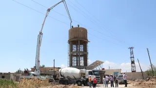 Syria, Qunitera governorate countryside, Ofania town, ICRC, and SARC Wathab teams during the ongoing construction works of the elevated water reservoir project.