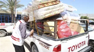 Misrata, ICRC sub-delegation warehouse. A staff from the Libyan Red Crescent is preparing an ICRC essential household items distribution for people displaced from Sirte.