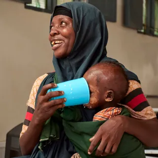 ICRC_Arbay Ahmed Siyid’s son is barely two years old. He has been in the ICU phase of the treatment for the past three weeks. Through a careful administered dose of therapeutic milk, he has been regaining his health. Despite the good progress, Arbay Ahmed, worries of her other six children she left back home in Jamame. Photographer: Abdikarim Mohamed