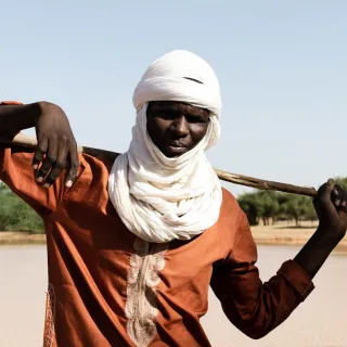 person standing in the heat