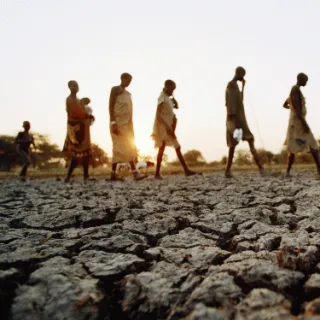 Draught, people walking on sand