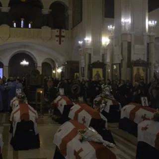 ICRC_Tbilisi, Sameba Church. Public ceremony before the funeral of twelve identified persons after missing._Photographer: ELIZBARASHVILI, SOPHIO