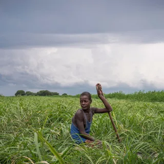 South Sudan - Young man in a grass field