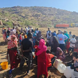People in Port Sudan with ICRC staff