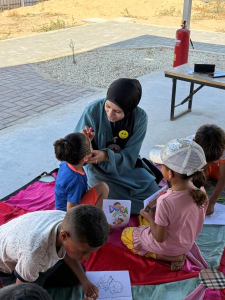 Dr%20Sally%20taking%20children%20through%20recreational%20activities%20to%20support%20mental%20health%20at%20the%20Gaza%20Field%20Hospital