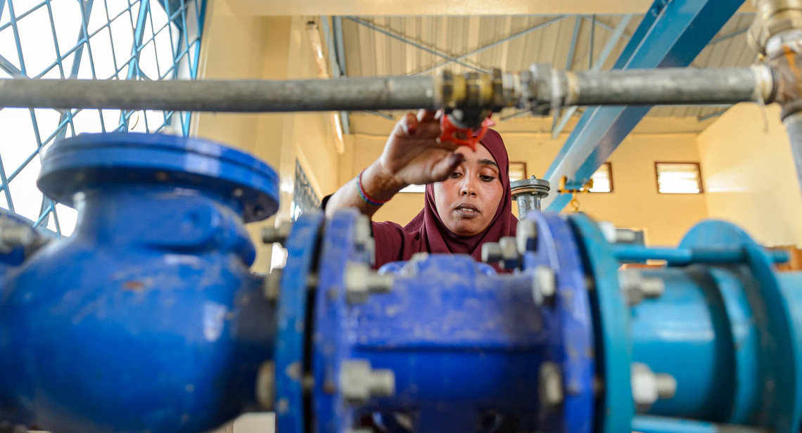 Khadija at the Masalani Water & Supply company doing her usual tasks