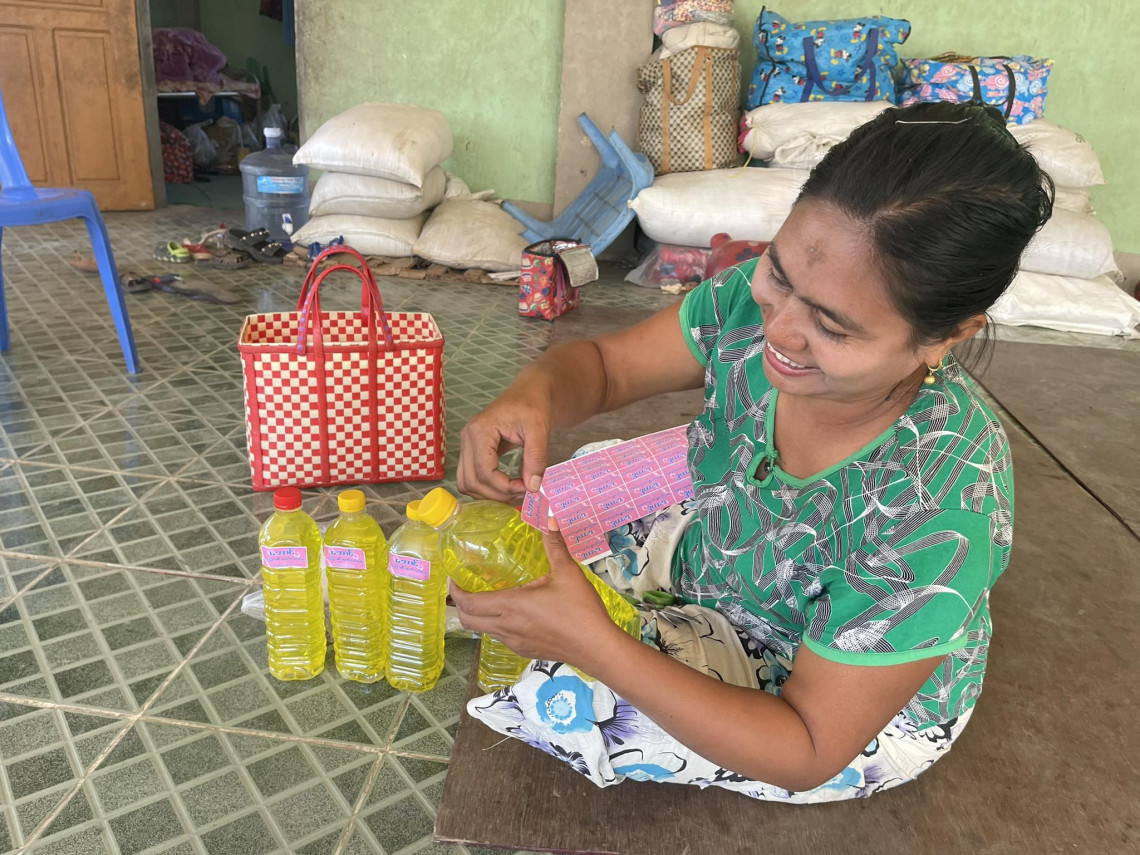 One of the residents of the displacement camp works at a unit to produce homemade soap. 