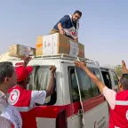 The ICRC supplies electronic and logistic gear to the Egyptian Red Crescent, enabling Sudanese arrivals to keep in touch with their families.
