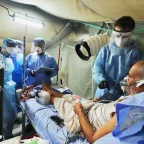 In Aden, Yemen, a patient potentially infected with COVID-19 receives care at an ICRC-supported COVID-19 health care centre.
