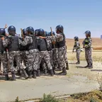 In Amman, Jordan, an ICRC delegate teaches Jordanian Gendarmerie staff the basic rules of maintaining order and the use of force.