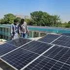 ICRC Water and Habitat staff inspecting the newly installed solar hybrid power system at Mirwaid Regional Hospital in Kandahar