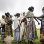Tigray. An ICRC staff screens conflict affected children and woman for malnutrition. 