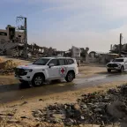 Red Cross vehicles enter the southern Gaza Strip heading northon January 19, 2025. The convoy is part of an operation to receive and transfer prisoners following the ceasefire.