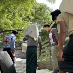 ICRC staff oversees the distribution of agricultural supplies in Myanmar.