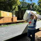 ICRC staff unloading essential household items at Sumisip, Basilan Philippines