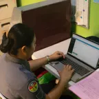 Jail Officer Casaje accessing the Health Information System website