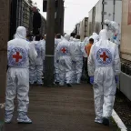 ICRC staff observing a transfer of human remains between Russia and Ukraine in June 2025. 