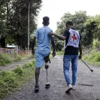 Tigray, Shire Hospital. A member of ICRC's physical rehabilitation team helps a patient practice walking with his prosthesis. 