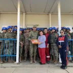 Kath Stewart, the ICRC’s Regional Coordinator for Armed and Security Forces in the Asia-Pacific, with Chinese Platoon at Khaan Quest 2025. 