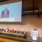 ICRC Vice President Giles Carbonnier stands behind podium delivering statement 