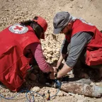 Note: The items in this picture were assessed as safe to be moved by ICRC staff who are qualified and experienced specialists conducting explosive ordnance disposal under strict safety rules. The ICRC strongly discourages all persons not qualified in explosive ordnance disposal from attempting any form of touching, moving or removing (demining) of explosive ordnance themselves.