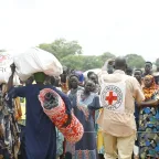 ICRC staff supplying essential items to refugees.