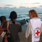 A woman evacuated from the war zone awaits her husband's arrival in Trincomalee, Sri Lanka.