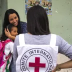 A mother hugs her daughter as she talks to an ICRC field staff in Norte de Santander, Catatumbo region, San Calixto. 