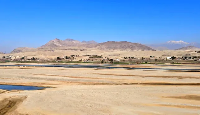 A landscape view of a drying Kabul River flowing towards Jalalabad province