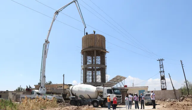 Syria, Qunitera governorate countryside, Ofania town, ICRC, and SARC Wathab teams during the ongoing construction works of the elevated water reservoir project.