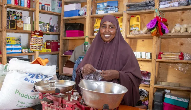 Photo of beneficiary in her ICRC supported shop