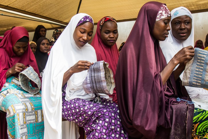 Maiduguri, Nigeria. Some widows sew hats for 500 Naira each (CHF 2.50) to earn a little money.