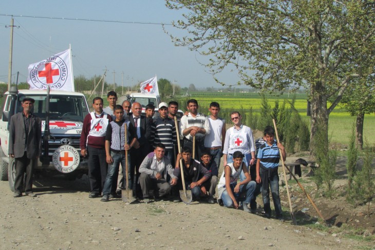 The tree-planting crew, with the protective emblem of the ICRC much in evidence.