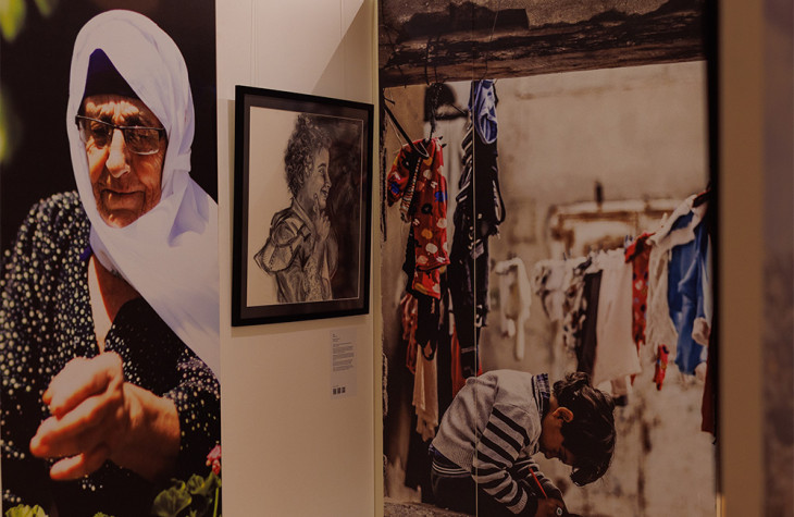 Photograph of an artwork created by Marwa Charmand showing people impacted by conflict